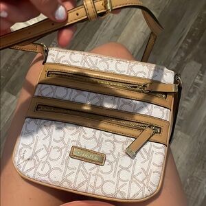 Calvin Klein Tan and White Crossbody Bag with Monogram Pattern